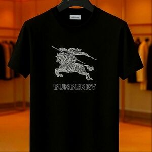Iconic Burberry-style T-shirts with bold knight logo.Available in black, navy,